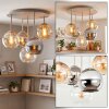 Cluster-plafondlamp Koyoto met 5 bollen in amber en rookkleurig glas