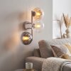 Moderne wandlamp Gastor met drie glazen bollen in helder, amber en rookglas