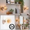 Moderne bolvormige wandlamp Gastor naast de spiegel met amberkleurige glazen kap, set van 2