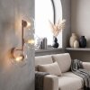 Moderne bolvormige wandlamp Koyoto met heldere glazen schermen en E14-fittingen