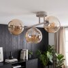 Moderne plafondlamp Koyoto met drie ronde amberkleurige glazen kappen in lijn