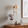 Wandlamp Gastor met drie bollen in amberkleurig, rook- en helder glas, E14-fittingen