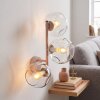 Moderne zandkleurige wandlamp Ripoll met 3 heldere glazen bollen in verticale opstelling