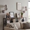 Moderne wandlamp Koyoto, 2-delige set met drie rookglazen bollen in verticale cluster
