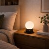 Brilliant LED bolvormige tafellamp Dori, witte glazen kap, 2700 Kelvin warmwit