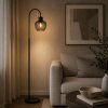 Brilliant Leuchten gebogen staande lamp Ligari met druppelvormige kap van rookglas