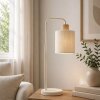 Brilliant Tafellamp Arlo met gebogen arm, beige cilindrische stoffen kap en houten detail