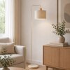 Brilliant Boho-vloerlamp Arlo met beige cilindervormige stoffen kap en houten detail